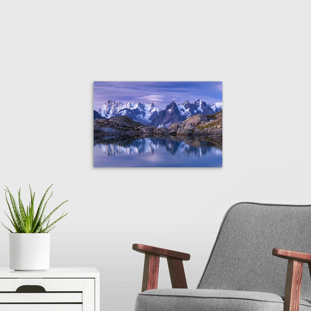 A modern room featuring Morning view of the French Alps refelcted in Lac Blanc.
