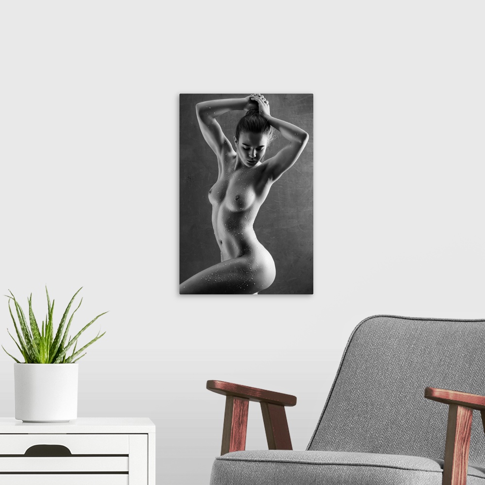 A modern room featuring Elegant black and white fine art photograph of a nude woman posing with water drops all over her ...