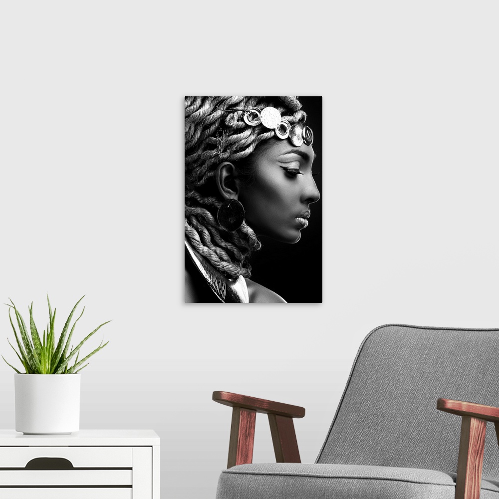A modern room featuring A black and white portrait of a woman in profile with an elaborate headdress.