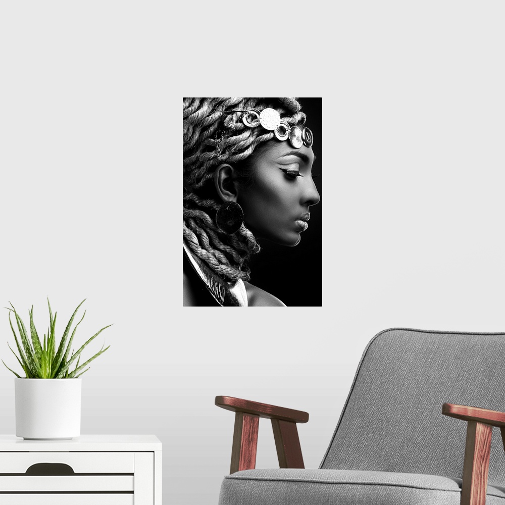 A modern room featuring A black and white portrait of a woman in profile with an elaborate headdress.