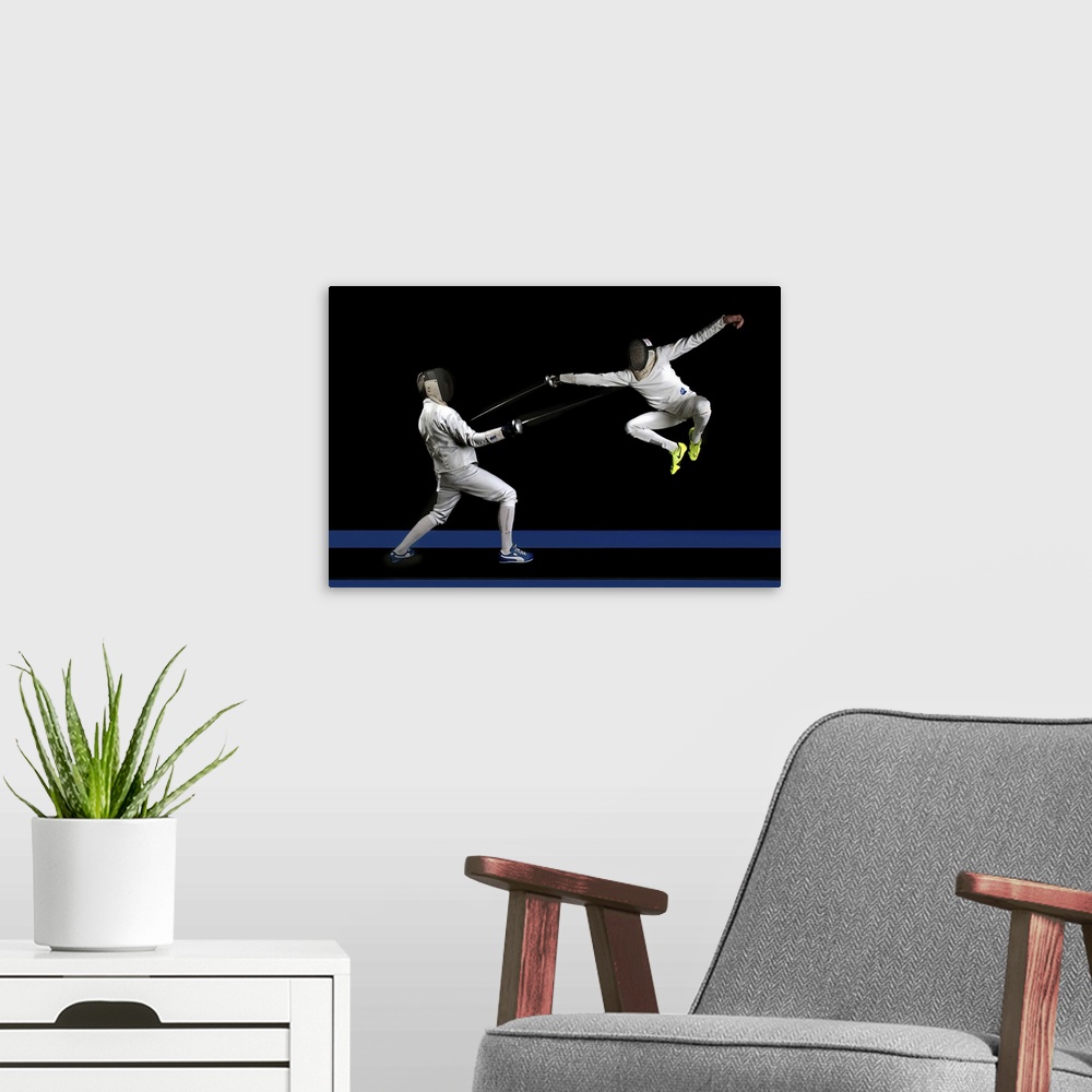 A modern room featuring Two people fencing, one leaping into the air to strike.