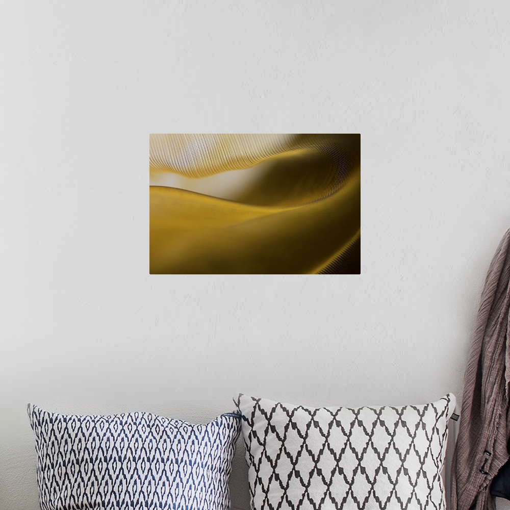 A bohemian room featuring Abstract image of the folds and fibers of golden fabric.