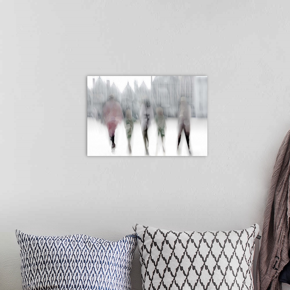 A bohemian room featuring Abstract image of five figures walking in a city street, with blurred motion and altered colors.