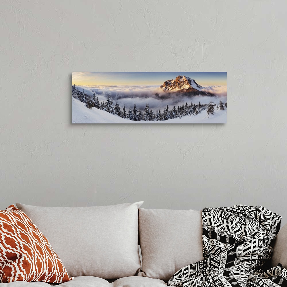 A bohemian room featuring Panorama of Rozsutec in the clouds at sunset, Mala Fatra, Slovakia.