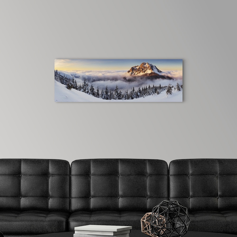 A modern room featuring Panorama of Rozsutec in the clouds at sunset, Mala Fatra, Slovakia.
