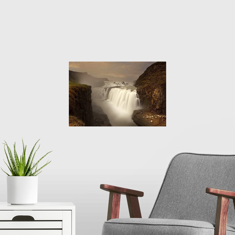 A modern room featuring A view of the beautiful Gullfoss Waterfall in the mountains of Iceland.