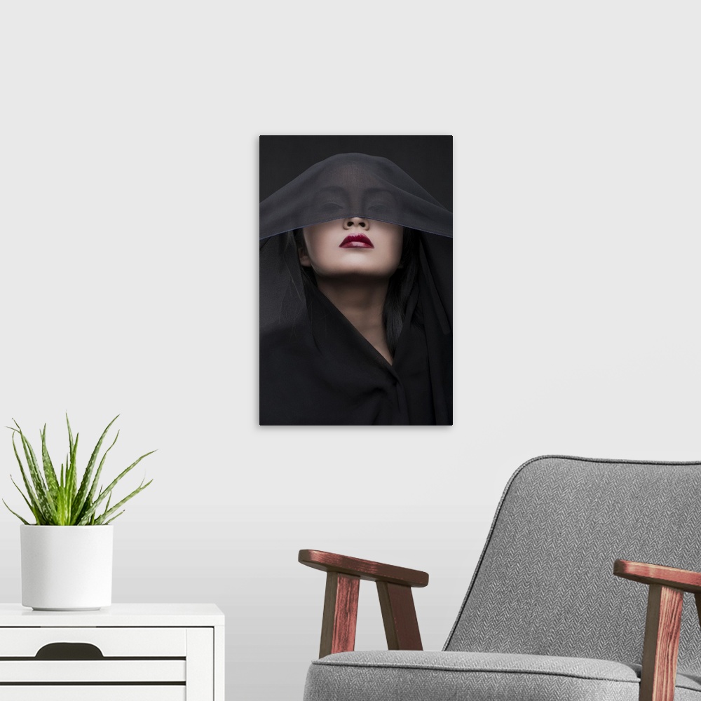 A modern room featuring Portrait of a woman with red lipstick and a black veil over her eyes.