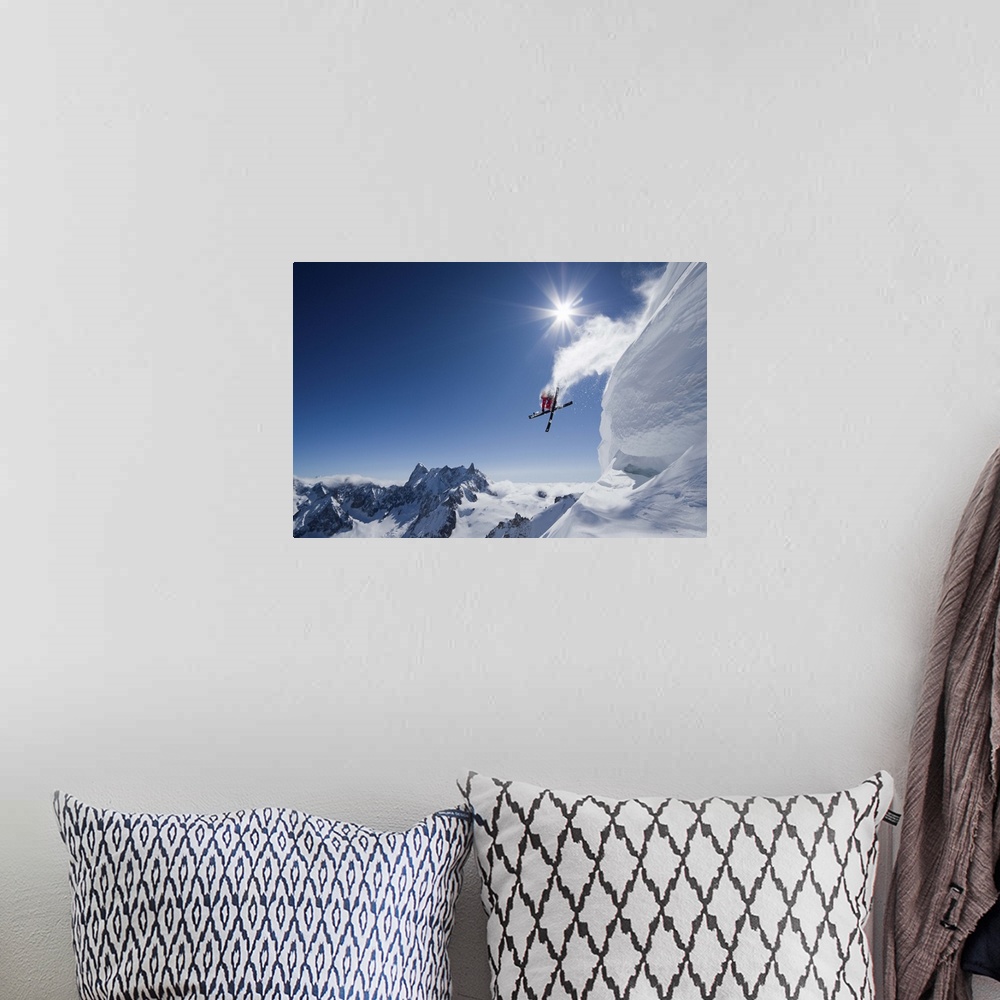 A bohemian room featuring Skier Guerlain Chicherit jumping off a snowy cliff, Chamonix, France
