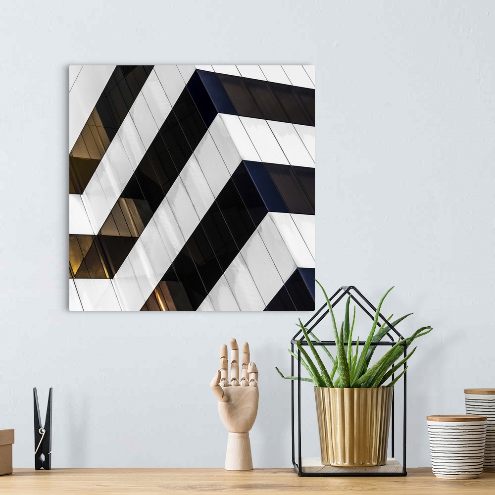 A bohemian room featuring Square fine art photograph of part of a black and white striped building facade.
