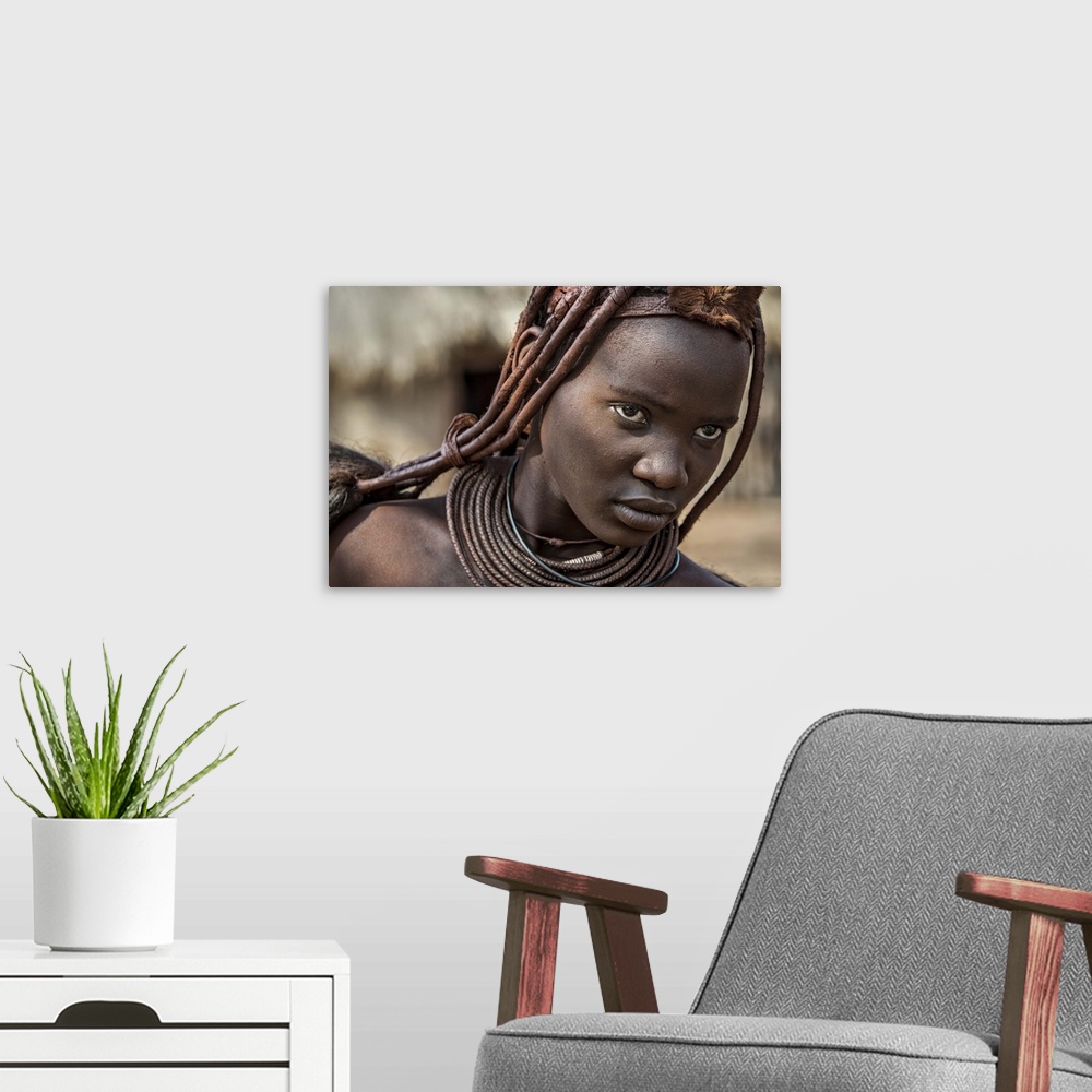 A modern room featuring Tribeswoman with a fierce look on her face.