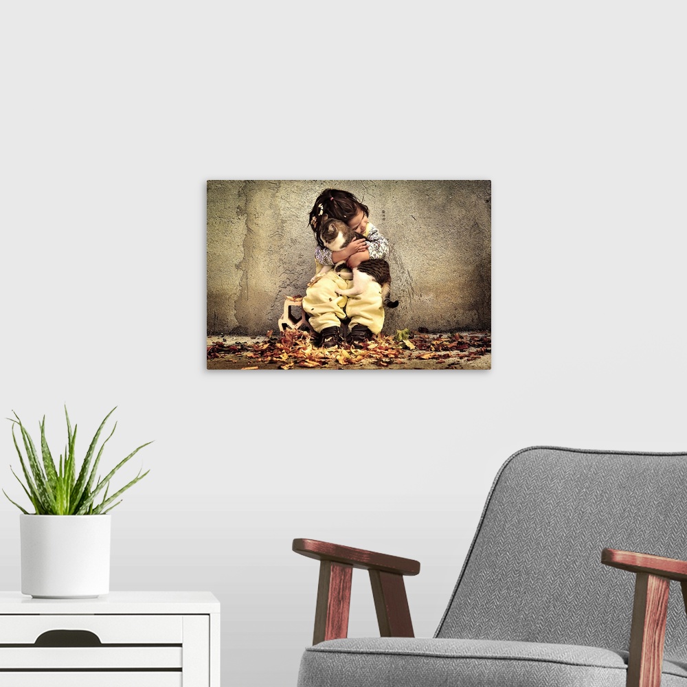 A modern room featuring A portrait of a little girl sitting against a wall and holding a cat in a loving embrace.