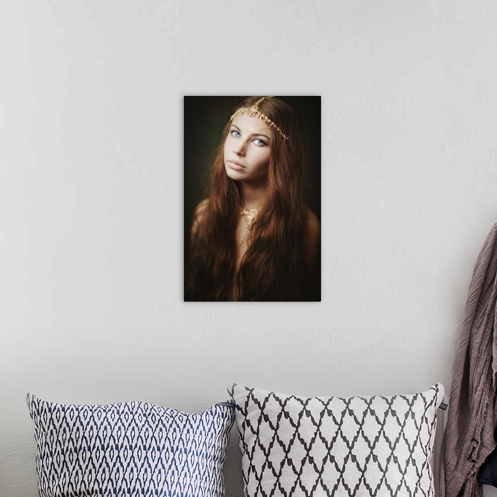 A bohemian room featuring Portrait of a beautiful woman with long hair wearing a beaded headband.