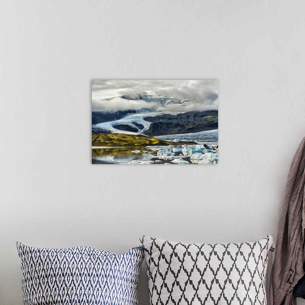 A bohemian room featuring Beautiful Icelandic landscape featuring glacial mountains and icebergs.