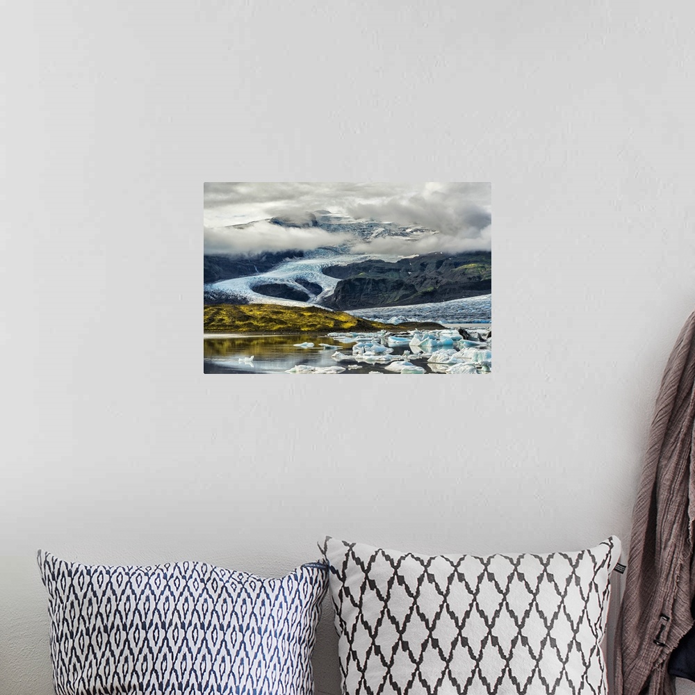A bohemian room featuring Beautiful Icelandic landscape featuring glacial mountains and icebergs.