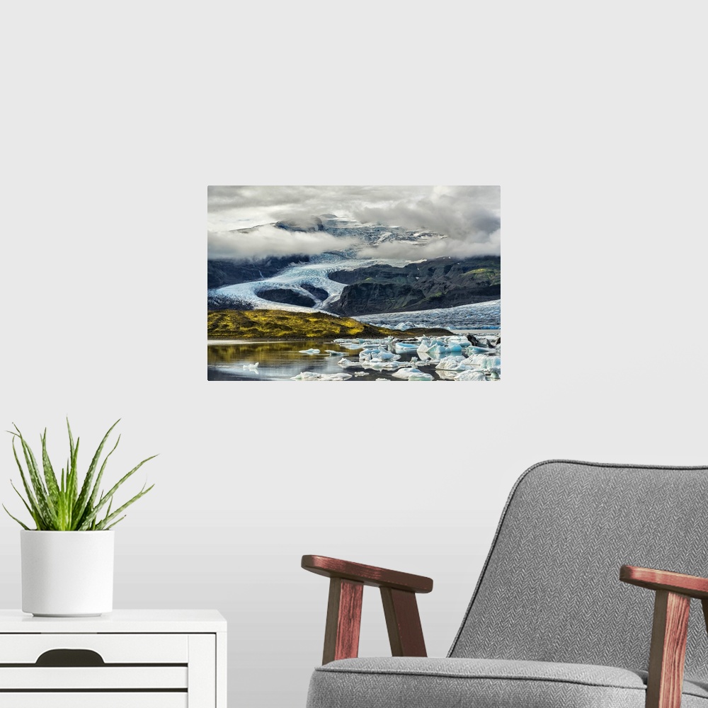 A modern room featuring Beautiful Icelandic landscape featuring glacial mountains and icebergs.