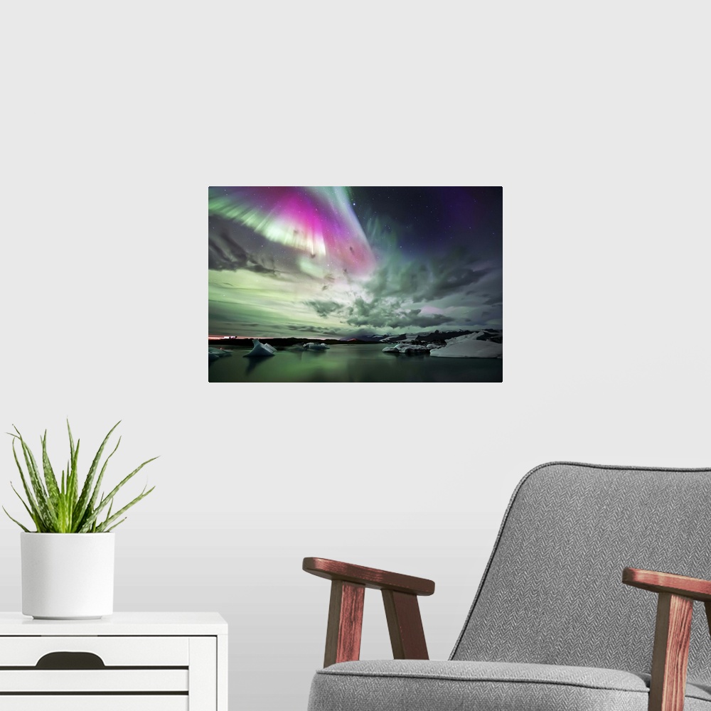 A modern room featuring Stunning northern lights display over the glaciers in Jokulsarlon Lake in Iceland.
