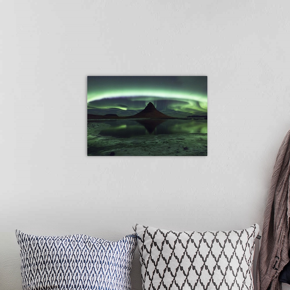 A bohemian room featuring Swirling and glowing northern lights above Kirkjufell Mountain in Iceland.