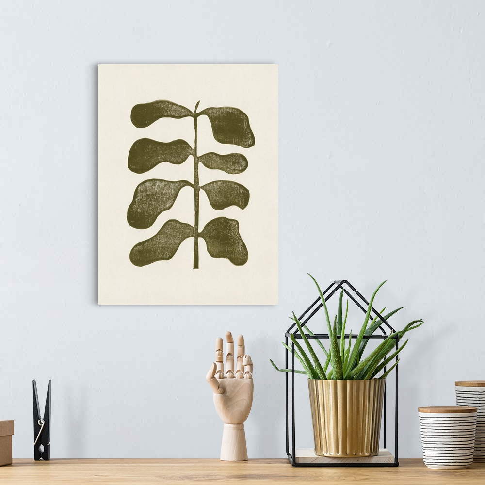 A bohemian room featuring A very simple but impactful linocut print of a single olive green plant with large leaves. Suitab...