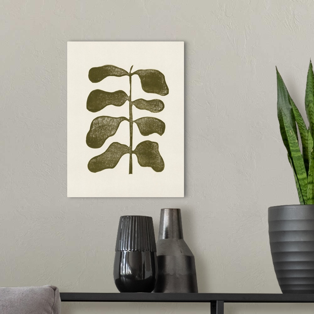 A modern room featuring A very simple but impactful linocut print of a single olive green plant with large leaves. Suitab...