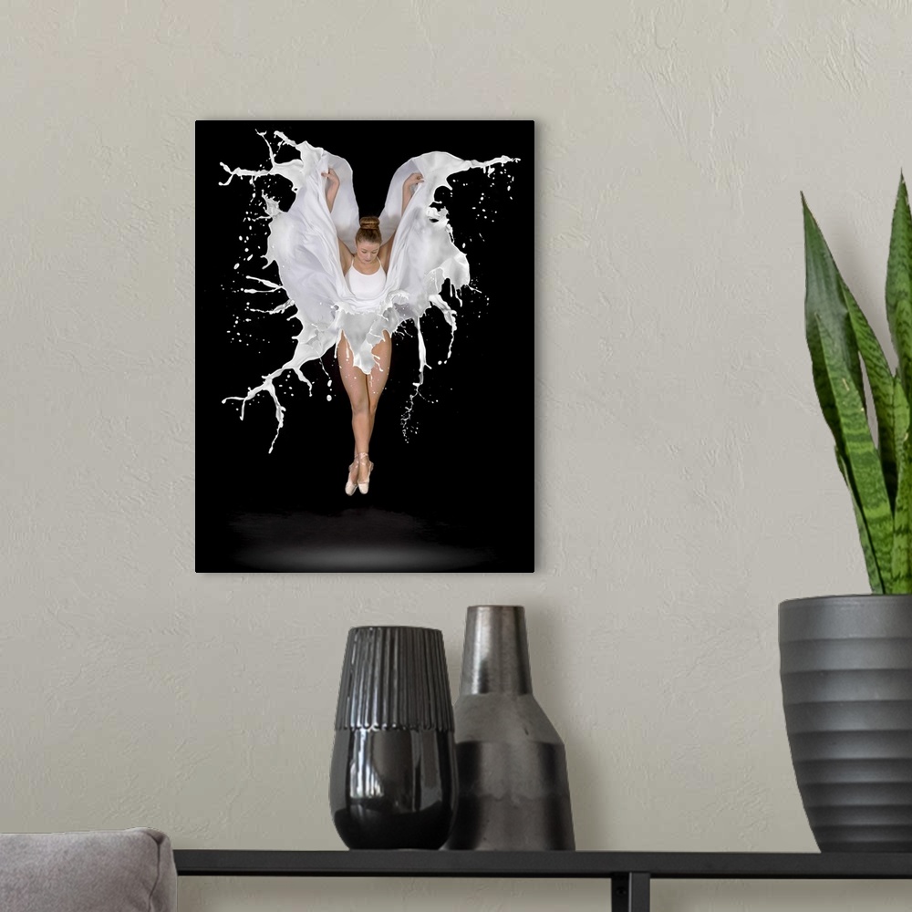 A modern room featuring Conceptual image of a dancer leaping, her dress appearing to be made out of liquid.