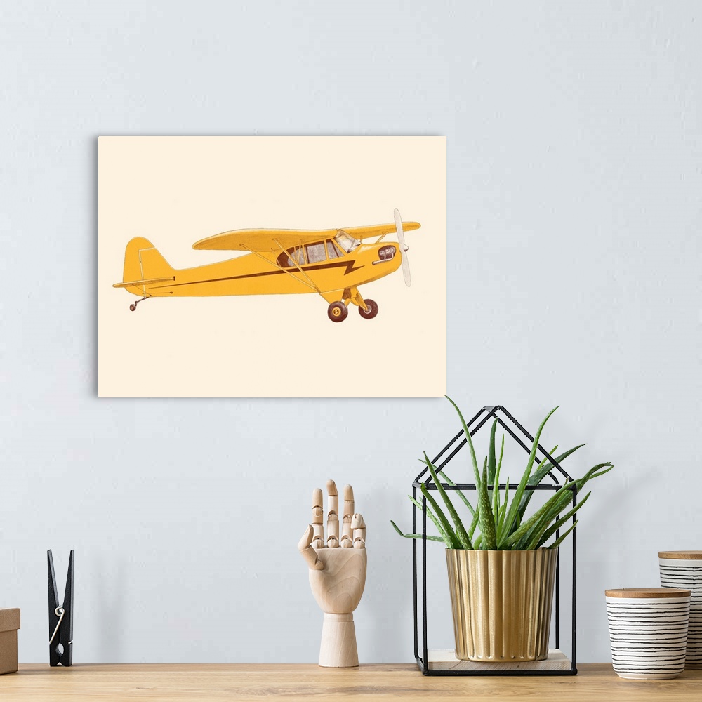 A bohemian room featuring Little Yellow Piper Cub