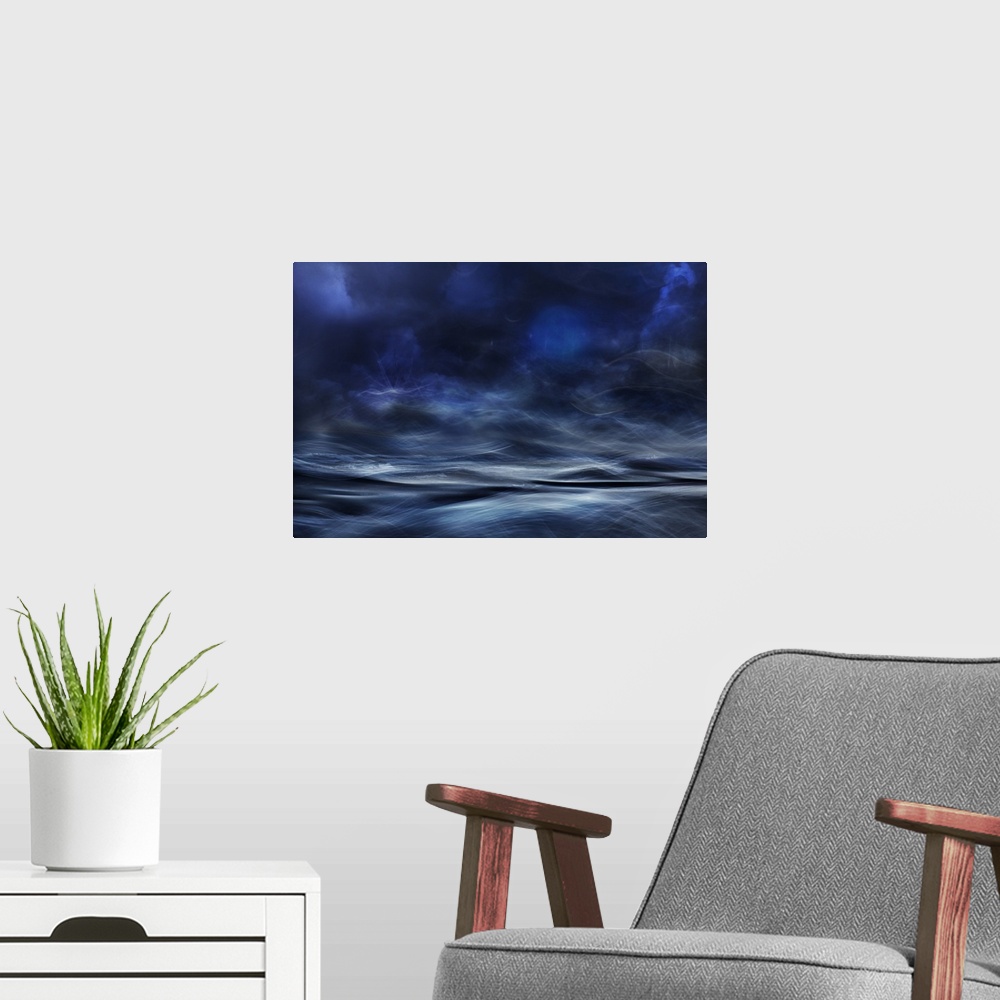A modern room featuring Abstract digital art with blue, white and black hues resembling a waterscape.