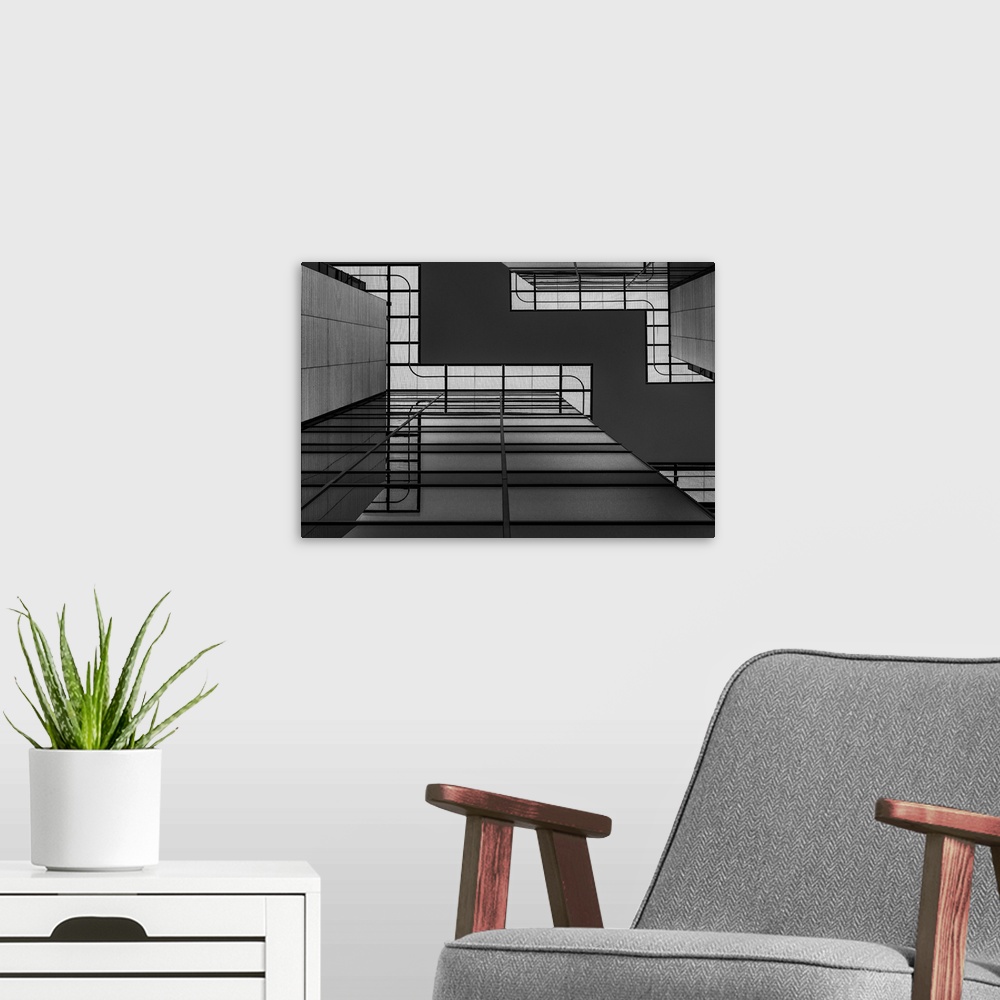 A modern room featuring Looking up at an abstracted view of architectural detail.