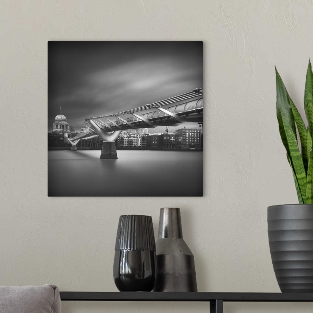 A modern room featuring Square black and white photograph of the Millennium Bridge with St. Paul's Cathedral in the backg...