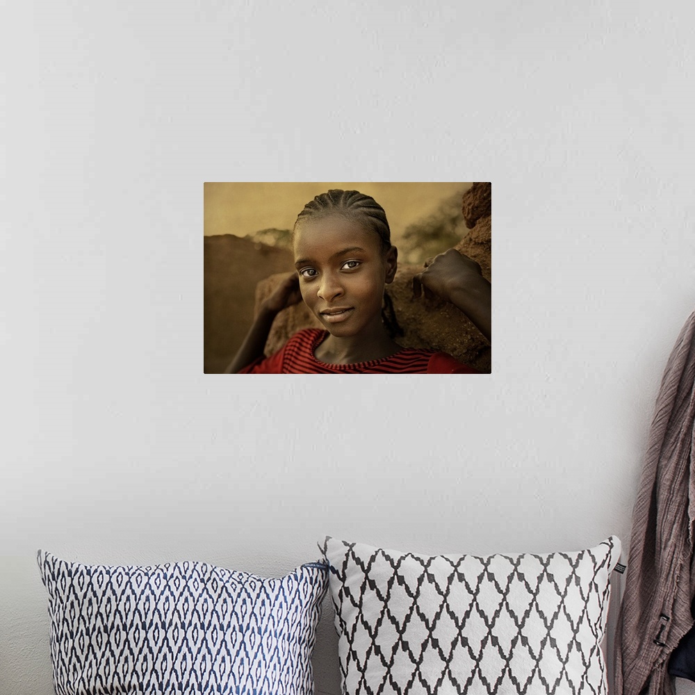 A bohemian room featuring Portrait of a beautiful young girl in Iferuan, Niger.