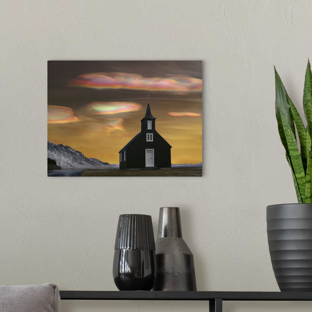 A modern room featuring A church in Iceland with Polar stratospheric clouds, also known as nacreous clouds or "glitsky," ...