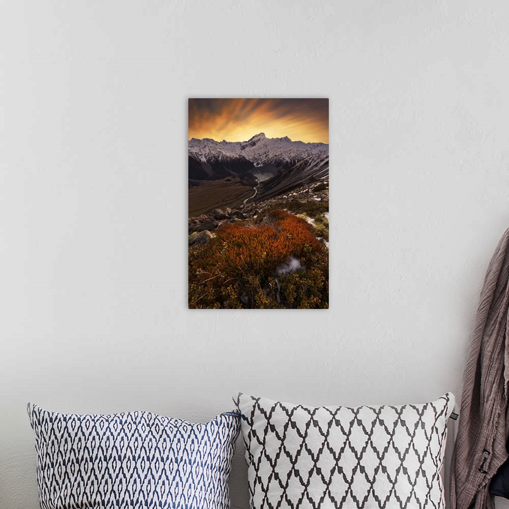 A bohemian room featuring Snowy mountain range over Mount Cook Village, with a glacial lake at the bottom, New Zealand.