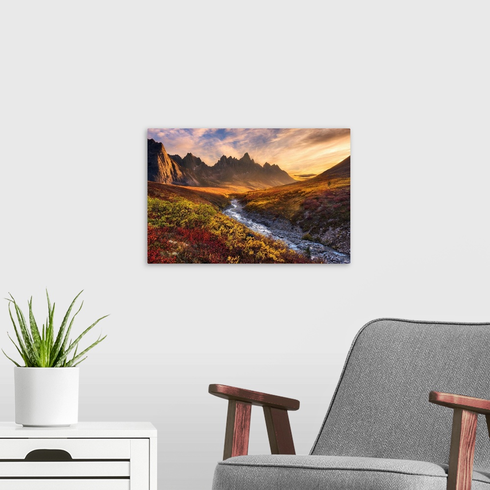 A modern room featuring Beautiful sunset light and colorful tundra looking toward Tombstone Mountain during Autumn in the...