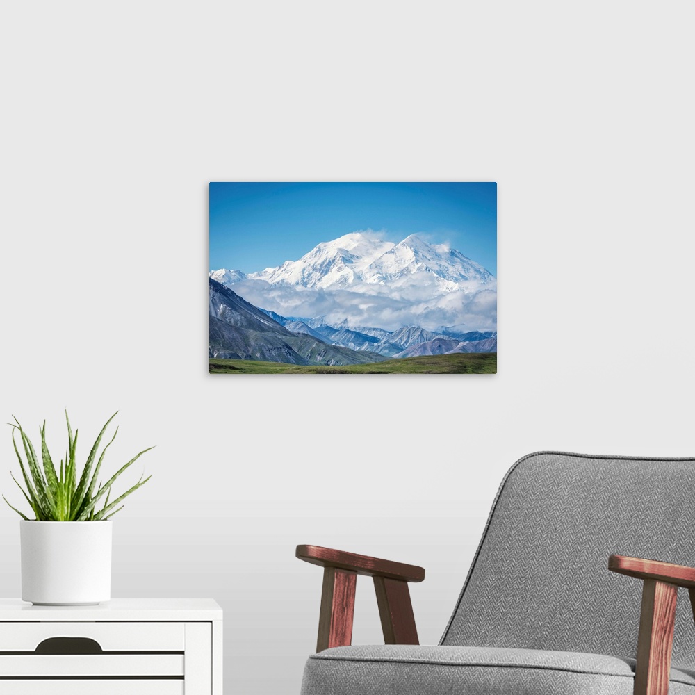 A modern room featuring Mt. Denali - Alaska 20,310'