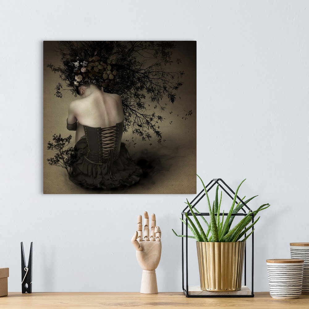 A bohemian room featuring Conceptual image of a woman with branches and flowers in her hair.