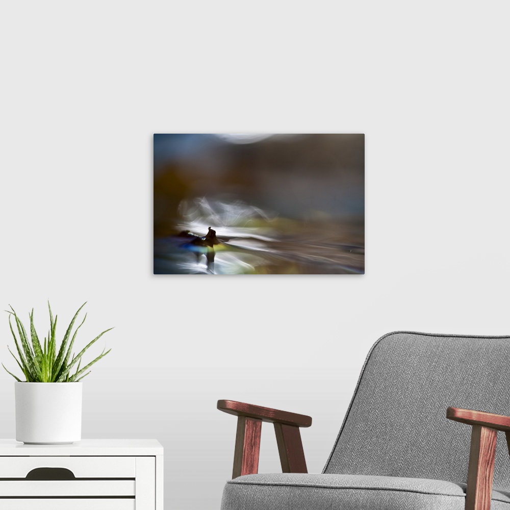 A modern room featuring Abstract digital art resembling a waterscape.