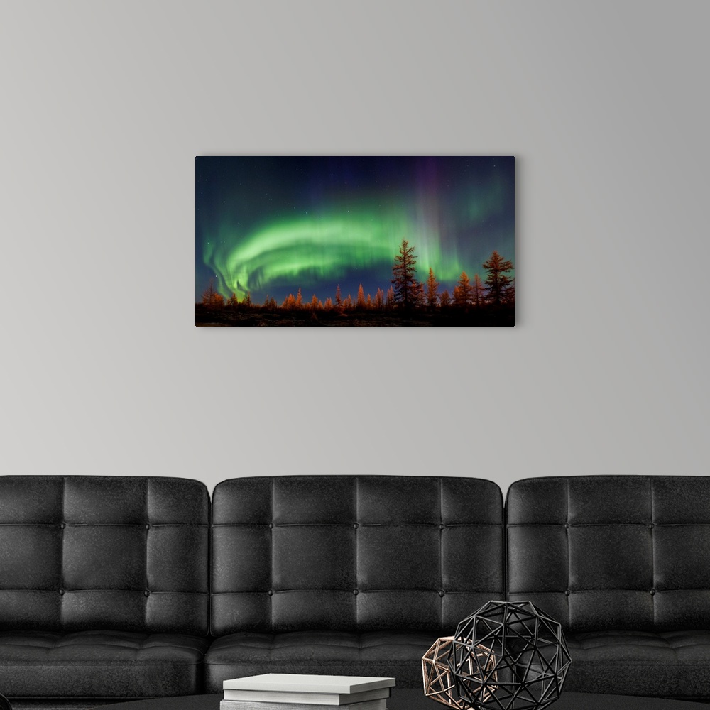 A modern room featuring Northern Lights