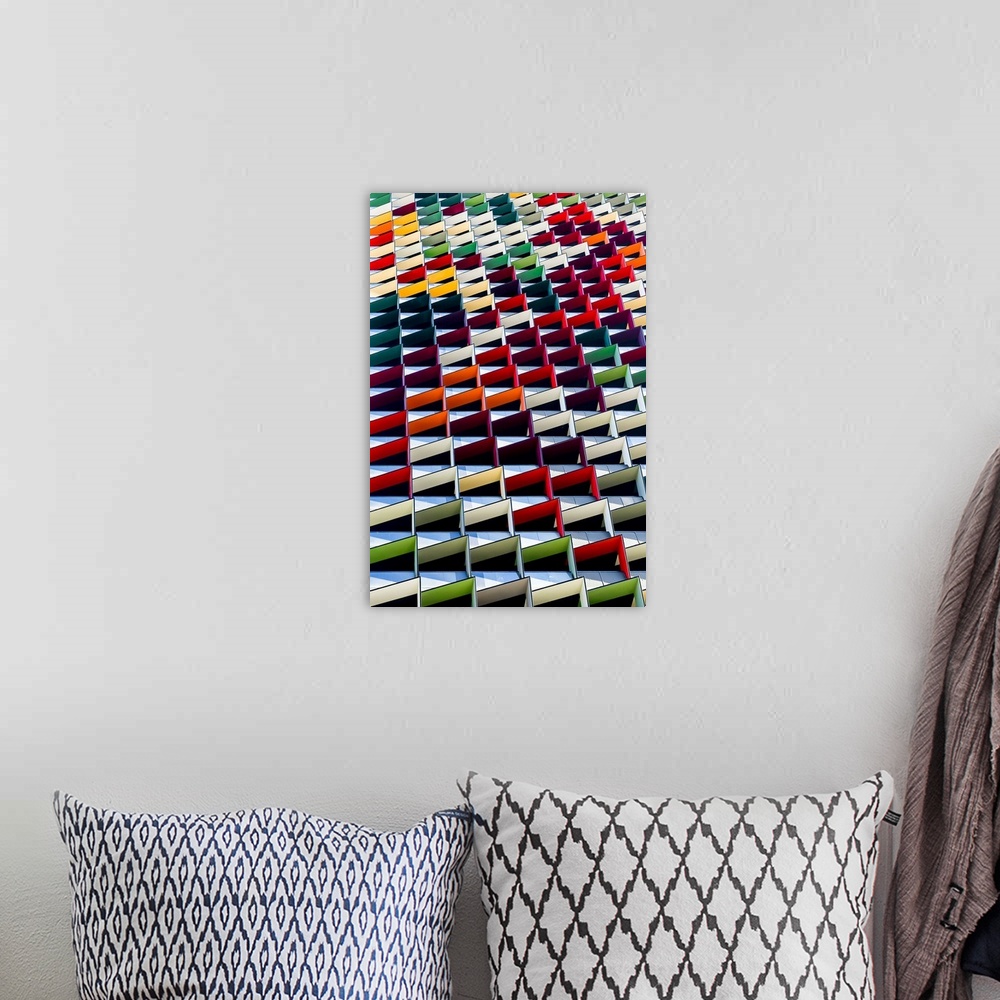 A bohemian room featuring Multicolored architectural design, creating an abstract image.