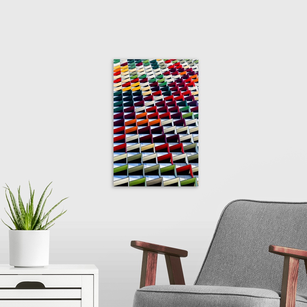 A modern room featuring Multicolored architectural design, creating an abstract image.