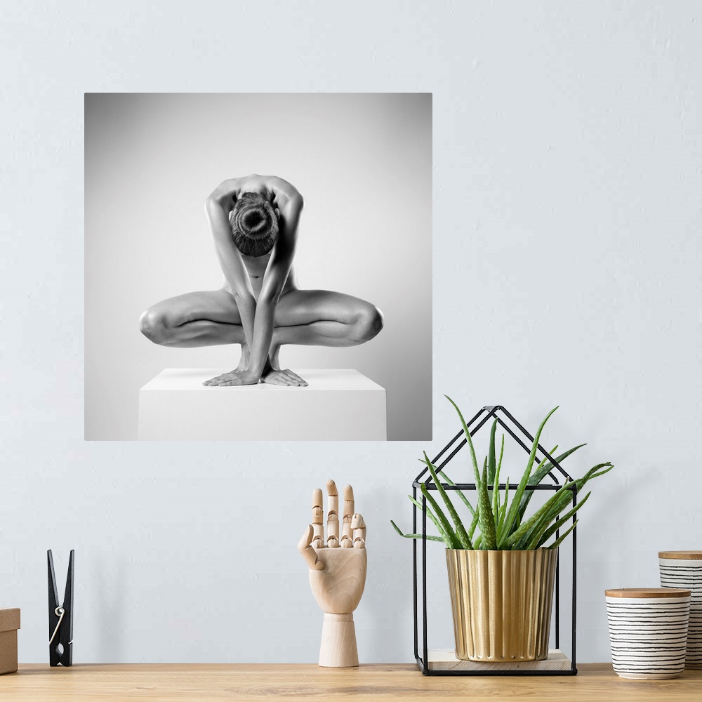 A bohemian room featuring Square high key fine art photograph of a nude woman posing as a sculpture and creating symmetry.