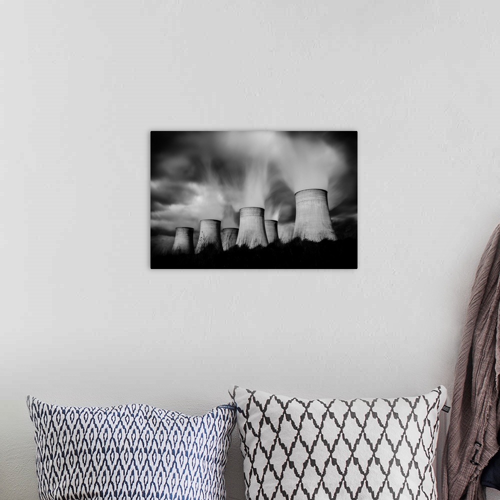 A bohemian room featuring black and white image of several cooling towers near Nottingham, England.