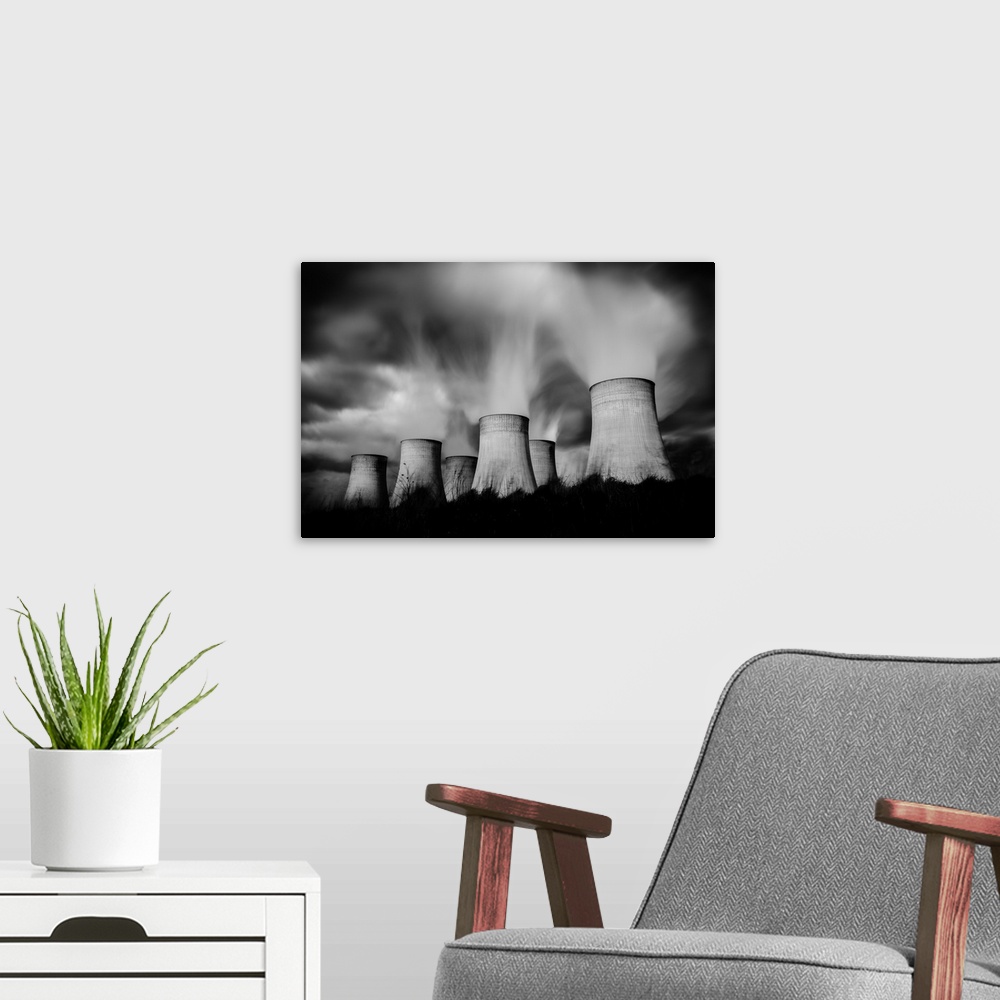 A modern room featuring black and white image of several cooling towers near Nottingham, England.