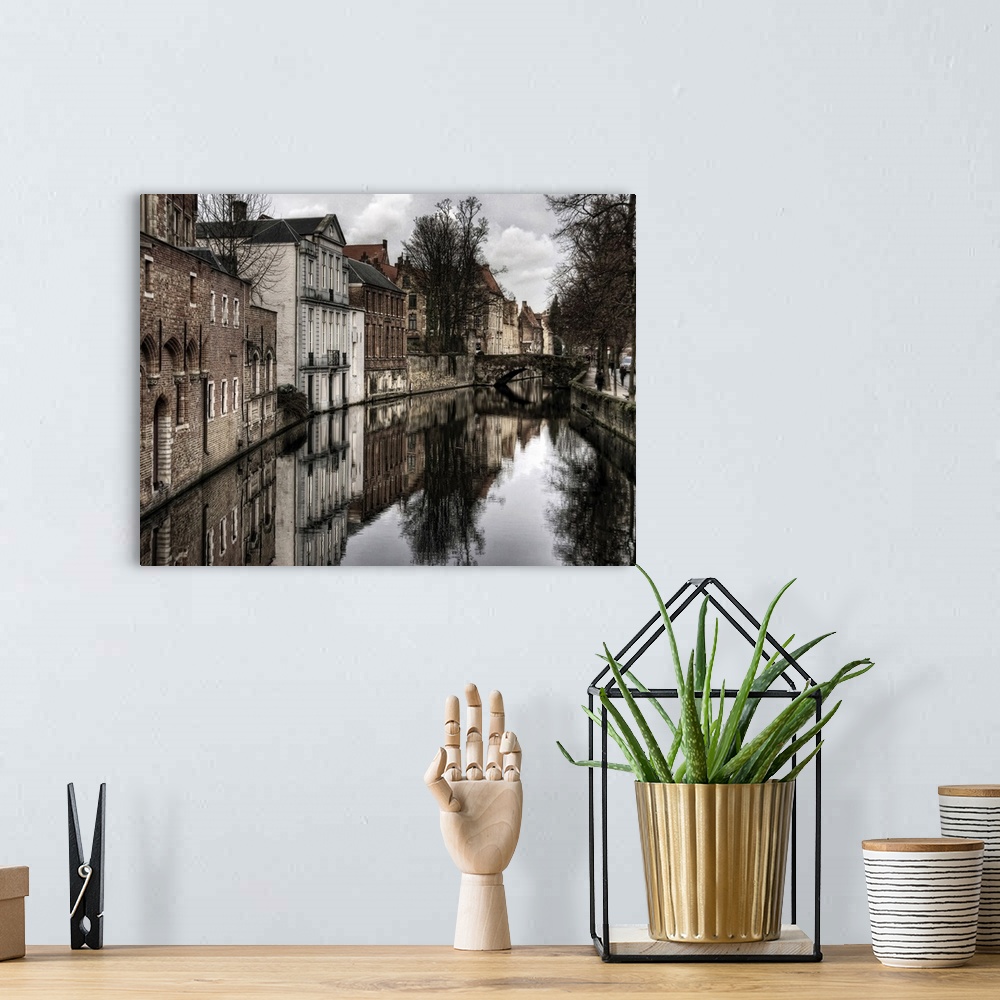 A bohemian room featuring Canal in the city of Bruges, Belgium, on a cloudy day in the winter.