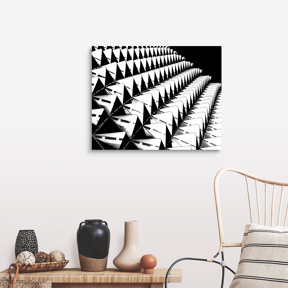 A farmhouse room featuring Rows of black and white structures creating an abstract image.
