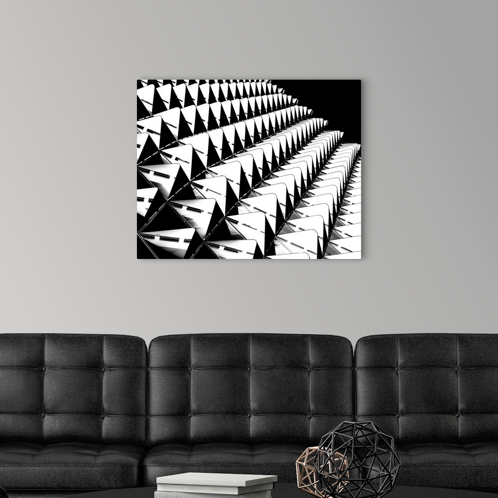 A modern room featuring Rows of black and white structures creating an abstract image.