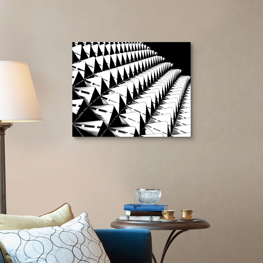 A traditional room featuring Rows of black and white structures creating an abstract image.