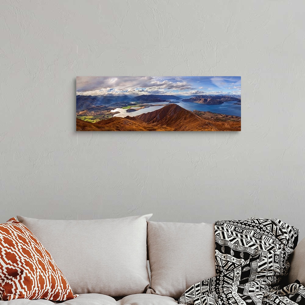 A bohemian room featuring Panorama from Roy's Peak of Lake Wanaka and Mount Aspiring, New Zealand.