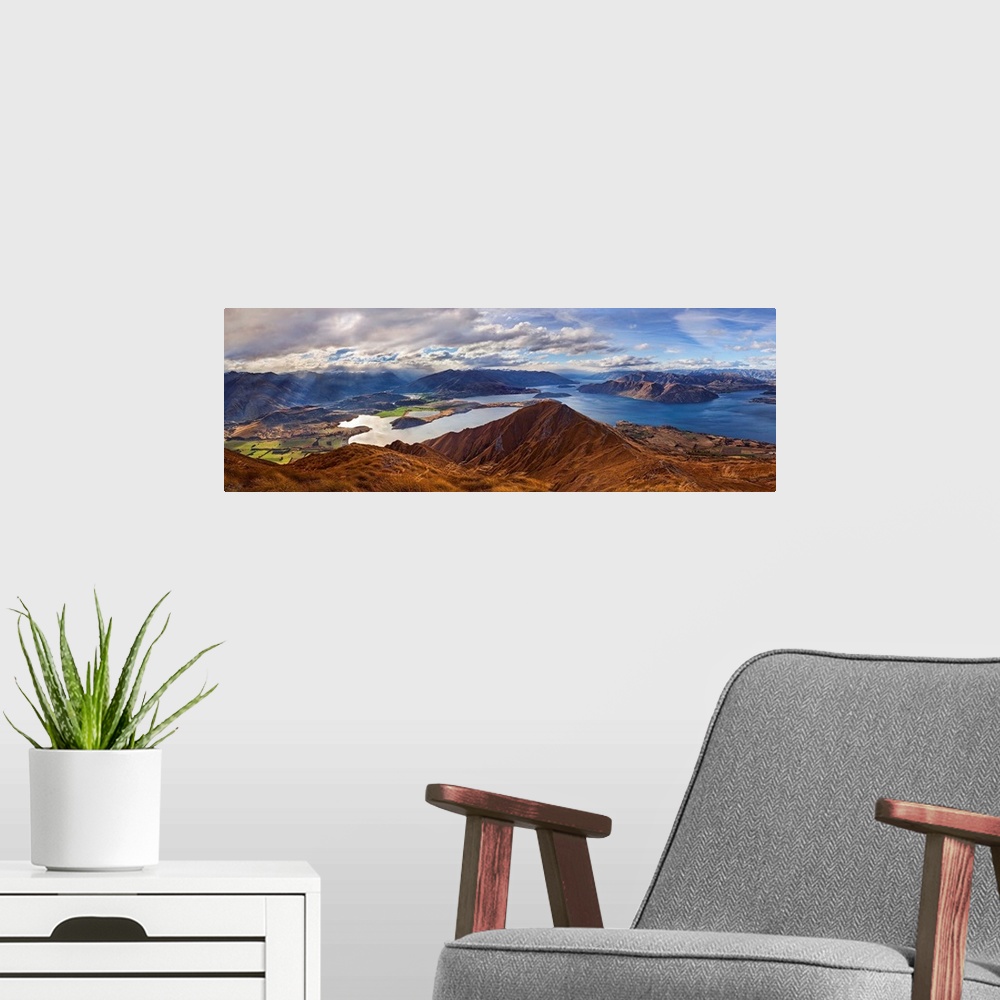 A modern room featuring Panorama from Roy's Peak of Lake Wanaka and Mount Aspiring, New Zealand.