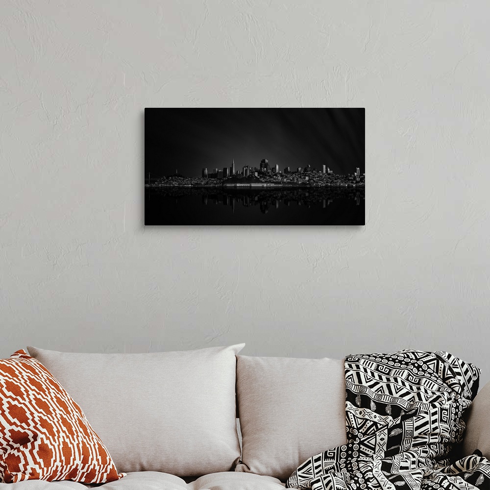 A bohemian room featuring Black and white skyline of San Francisco, California, at night.