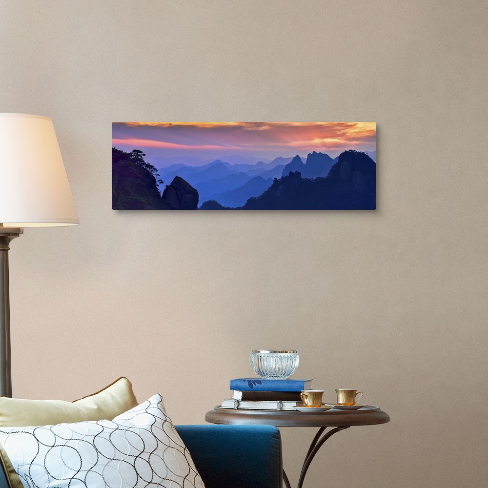 A traditional room featuring Beautiful, colorful panoramic landscape of Mount Sanqing, China at sunset.