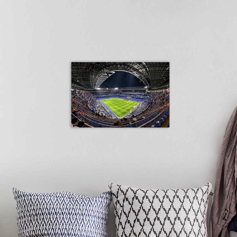 A bohemian room featuring Wide-angle view of the inside of the Madrid Football Stadium, Spain.